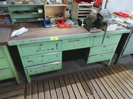 1 workbench, approx. 180 x 90 cm, 2 base cabinets, 3 drawers each, mounted vise