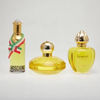 CHOPARD, JEAN PATOU & MOSCHINO. Lot of large factices / flacons, glass, plastic, 1980s/90s. (3).