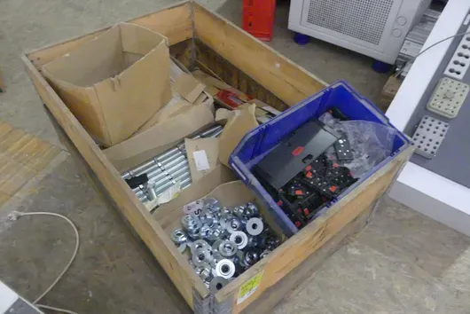 Metal parts assortment (galvanised threaded studs, washers/flange nuts, plastic brackets)