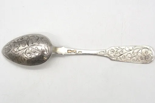 Antique Russian 875 silver/84 zolotniki spoon with elaborate chasing, Moscow, dated 1850