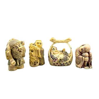 VIER ASIATISCHE BUDDHA FIGUREN.