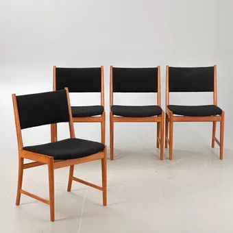 KAI LYNGFELDT LARSEN. Four chairs, teak, with black fabric upholstery, Vejen Polstermøbelfabrik Denmark, 1960s (4).