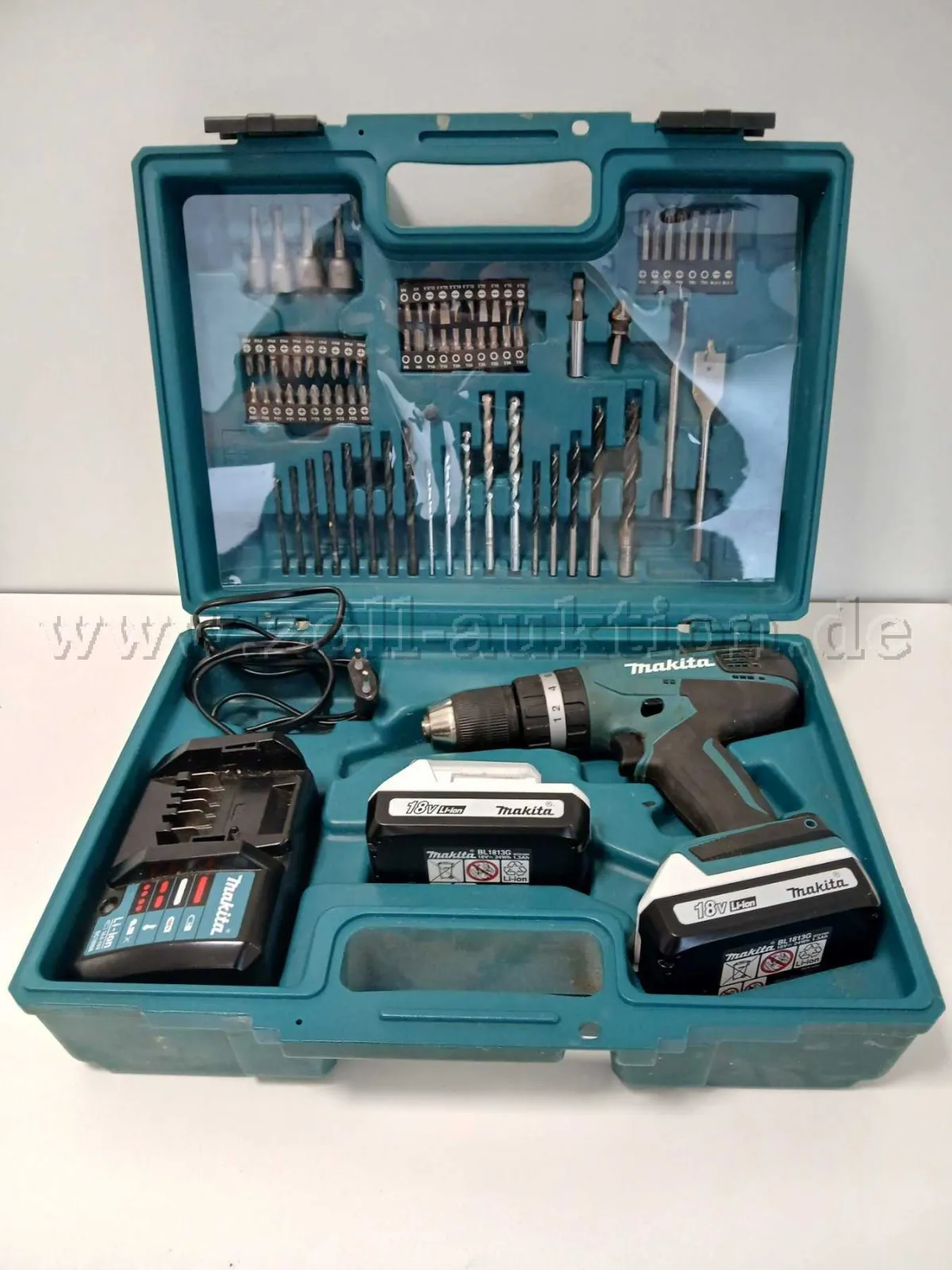 1 Makita Akku-Schlagbohrschrauber HP457D