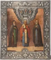 Icône de patronage avec les saints Macaire d'Unzha, Nicolas de Myre et Serge de Radonège, avec riza en argent