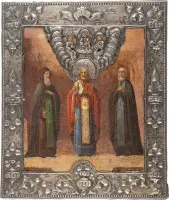Icône de patronage avec les saints Macaire d'Unzha, Nicolas de Myre et Serge de Radonège, avec riza en argent