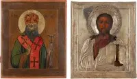 TWEE ICONEN: CHRISTUS PANTOKRATOR MET ZILVEREN OKLAD EN HEILIGE THEODOSIUS VAN UGLITSJ