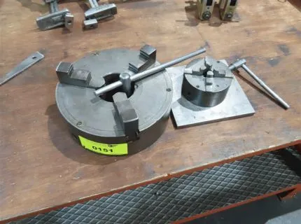 1 three-jaw chuck, diameter approx. 240 mm, 1 four-jaw chuck, diameter approx. 110 mm