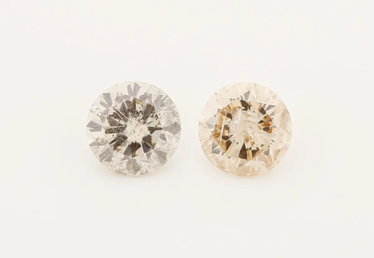 Lot 2 lose Brillanten zus. ca. 1.63 ct light brown-brown/p Schätzpreis: 1400, - EUR