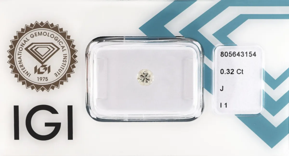 Brillant seul, 0.32 ct blanc lég.(J)/p1, scellé, expertise IGI jointe