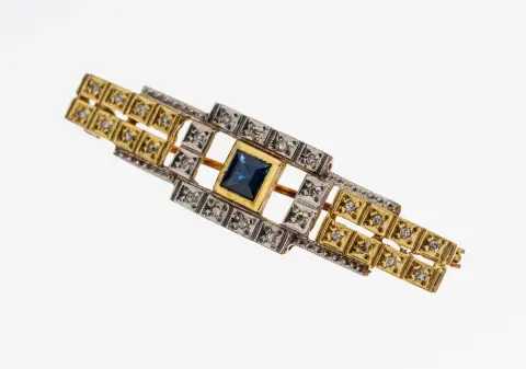 Broche saphir-diamant en or 8 kt, or 333/000, design géométrique, saphir central