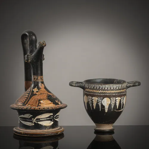 Two black-glazed ceramics