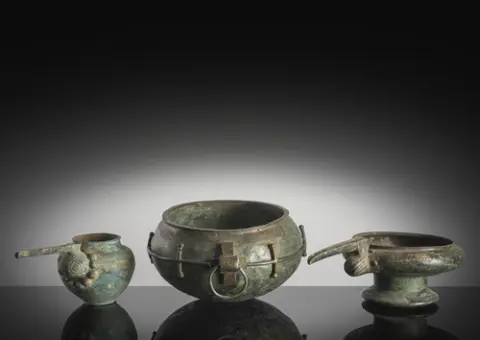 Lot of three metal vessels
