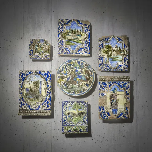 Seven Qajar tiles or tile fragments