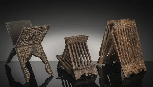 Three wooden Quran stands