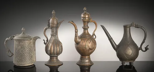 Four jugs, partly copper/bronze