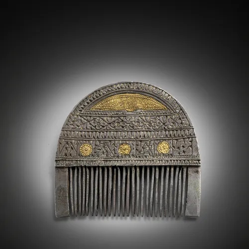 Fine comb made of partly gilded silver