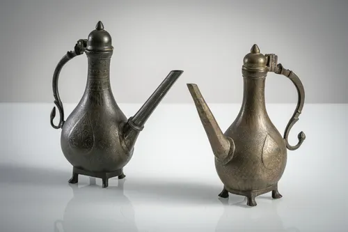 Two fine water jugs of chased bronze