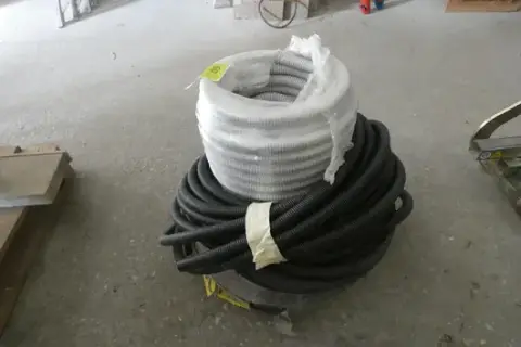 Lot of electrical corrugated conduits, grey and black