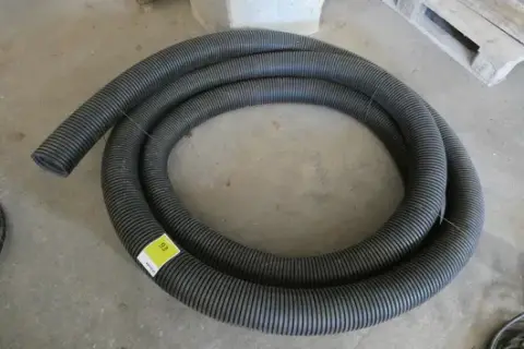 Roll of corrugated conduit, black