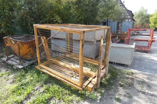 Crane pallet fork with mesh safety basket