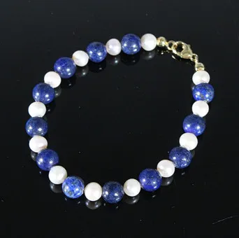 Bracelet avec SWZP et lapis-lazuli, or jaune 375.