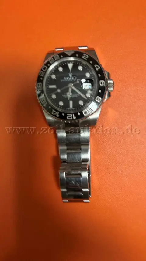 1 Herren Armbanduhr der Marke ROLEX, Modell GMT Master