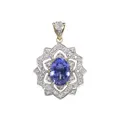 Flower-shaped necklace pendant with diamonds and tanzanite.