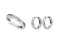 Set of white gold tension ring and earrings with diamonds.