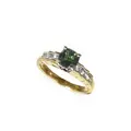 Delicate yellow gold ring with deep green tourmaline solitaire.