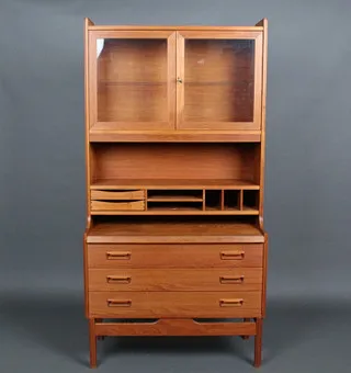 P. WESTERGAARD MØBELFABRIK. Bookcase / secretary with Curio-Top, teak. Denmark, 1960s.