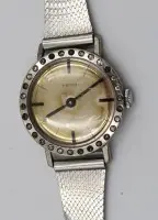 Montre-bracelet vintage pour dame, Heno, remontage manuel, mouvement fonctionne, lunette avec pierres claires, env. D-2,5cm, état porté