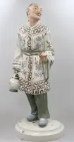 Chinese figure with lantern, Royal Dux, Czechia, painted, unfortunately broken at the little finger, approx. H 51 cm