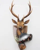 Décoration murale de chasse, tête de cerf avec cloches, plastique, env. H 40 cm