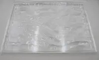 Plateau Kartell Dune transparent, design Mario Bellini, plastique, traces d'usure (rayures), env. 38 x 55 cm