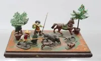 Tin figures on board, painted, hunting scene, rider figure present, board approx. 15 x 27 cm