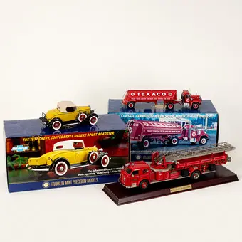 Three Franklin Mint model cars: Chevy, tanker and fire truck with ladder (3).