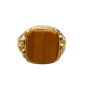 Tijgeroog en 333 geelgouden ring.