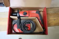 1 elektrické vrtací kladivo značky Hilti