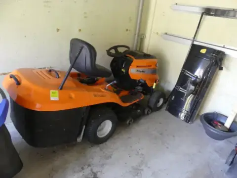 Oleo Mac ride-on mower, with snow blade