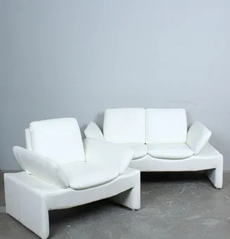 LEU SWISS. Two-seater and armchair, model '' Baccara '', 2000s.