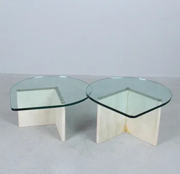 Two coffee tables in travertine and glass, Italy, 1980s.