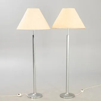 Two floor lamps with aluminium base, 1970s (2).