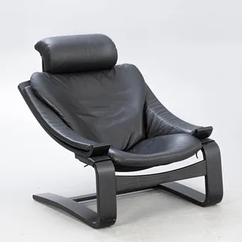 ÅKE FRIBYTER. Armchair 'Kroken', black leather, Roche Bobois.