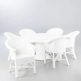 Hexagonal table and six armchairs, wood, bamboo and wicker, 20th/21st c. (7).