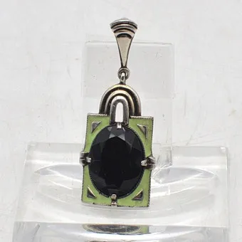 Theodor Fahrner. Designer pendant in 935 silver, enamelled, with large stone, Germany, around 1920s, master mark.