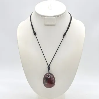 Blue amber as necklace, polished surface, with natural inclusions, 20th century.
