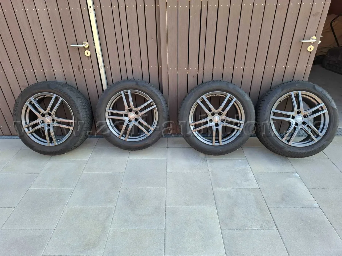 4 opony zimowe Pirelli na felgach aluminiowych Dezent