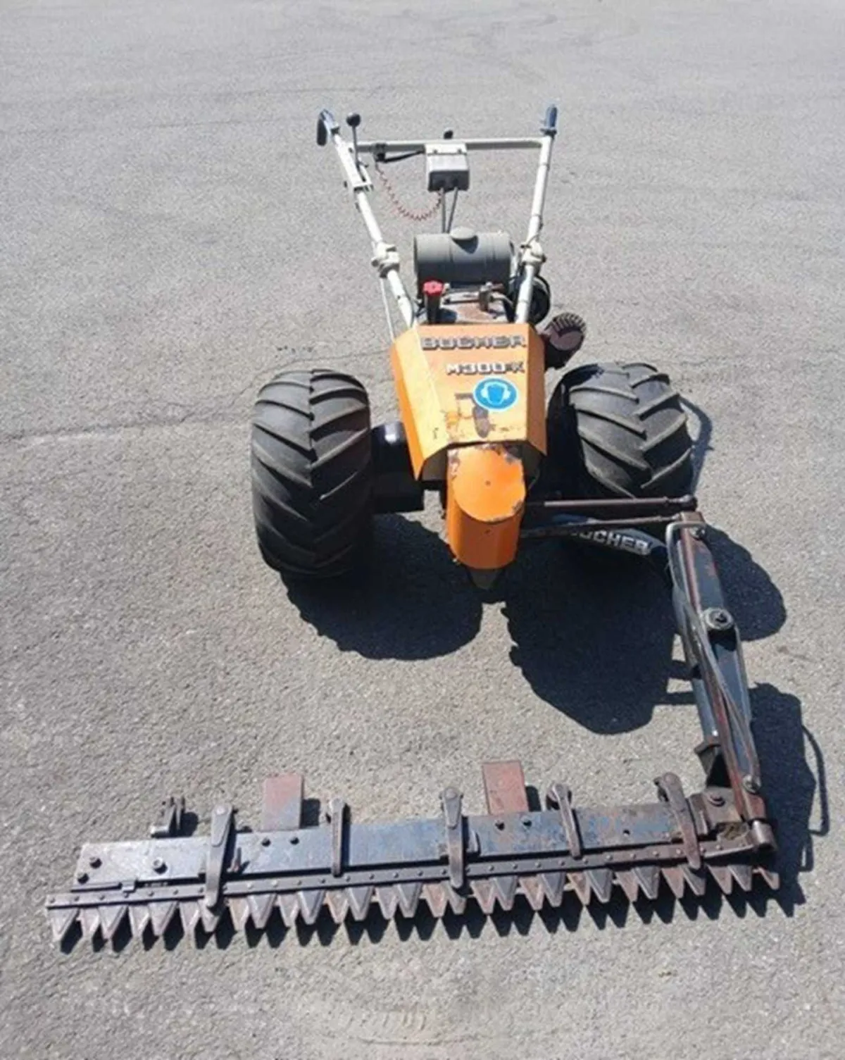 1 motorová sekačka Bucher M 300 KL