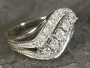 Ladies' ring – 750 WG, approx. 4.0 g total, curved ring head, set with brilliants, size 51/52