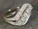 Bague femme – 750 or blanc, env. 4,0 g total, tête de bague courbée, sertie de brillants, taille 51/52